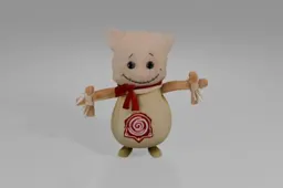 Small stuffed toy in the shape of a pig