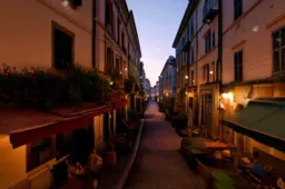 Narrow street in a European city at night