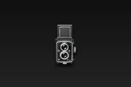 Black and white photograph of a vintage camera