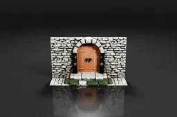 Wooden arched door with iron hinges and a handle is set in a stone frame