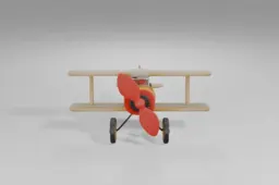 Toy biplane featuring a shiny yellow body, beige wings, large red spinning