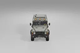 Rugged green military-style off-road vehicle stands on thick tires, equipped
