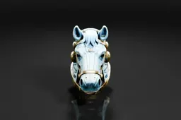 Close-up of a ring in the shape of a horse's head