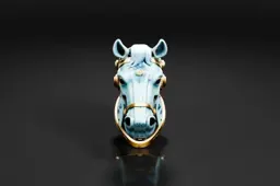 Close-up of a ring in the shape of a horse's head