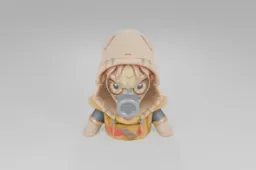 Toy figure with large cartoonish eyes wears a green gas mask and brown hooded