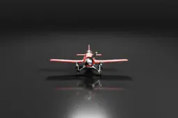 Small red airplane on a black background
