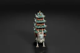 Photograph of a miniature figurine of a dragon